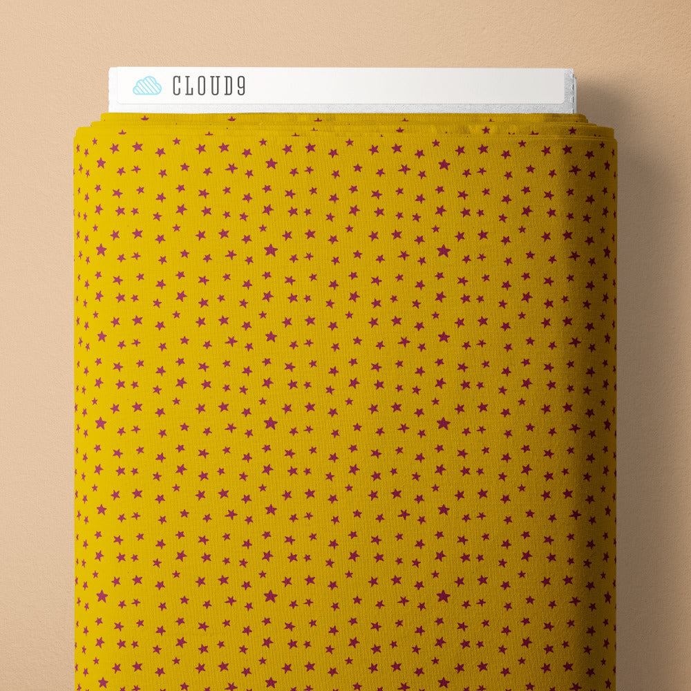 Yellow fabric with purple star pattern