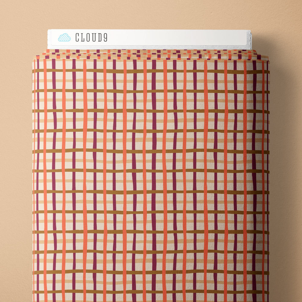 Plaid pattern with purple and orange colors on a light fabric background