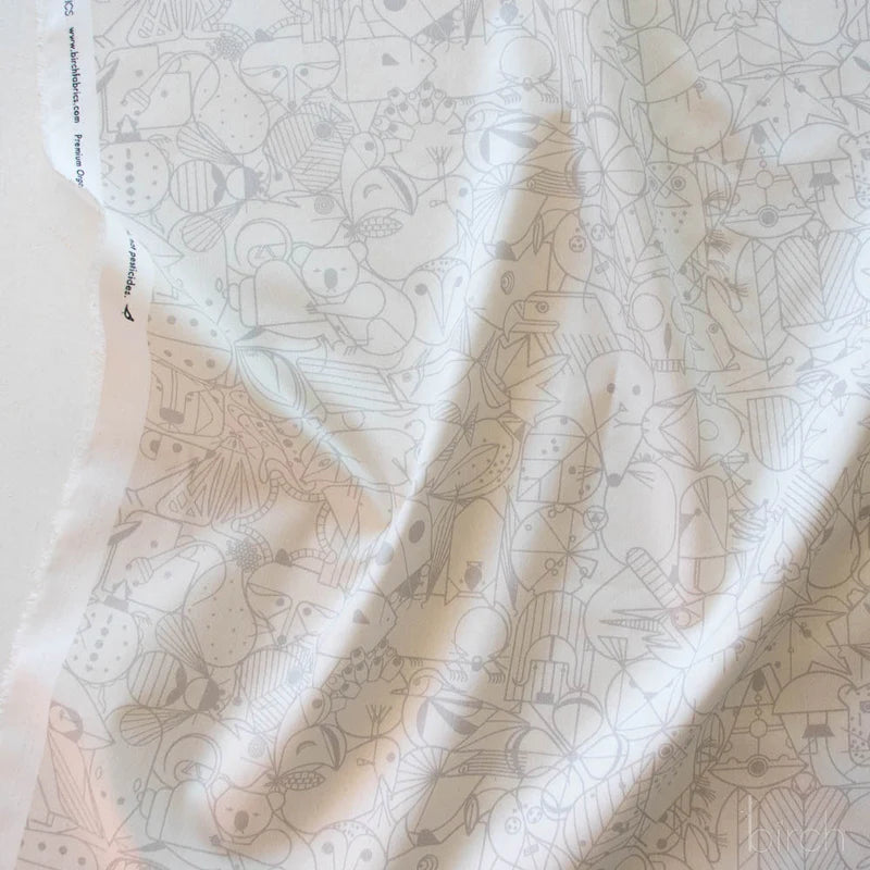 Patterned fabric with geometric animal illustrations in gray beige on an off white background
