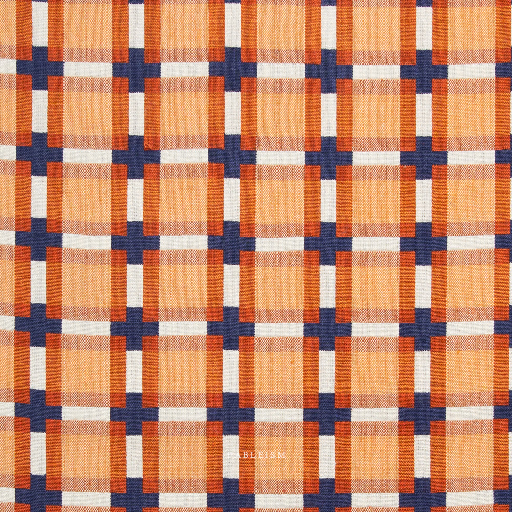 Close-up of orange, blue, and white checkered fabric
