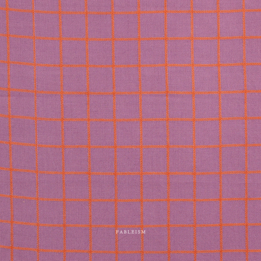 Purple fabric with orange grid pattern on a white background, featuring the brand 'Fableism'.